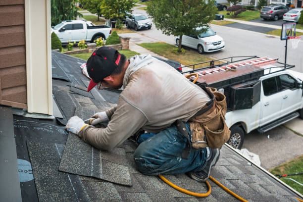 Professional Roof Replacement technician working in Shoshone, ID